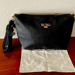 Black BCBG Paris Cross-body bag pre-owned but like new!!  14” x 9” x 3”.  Pebble